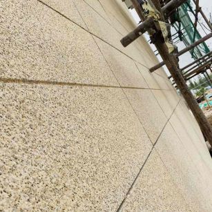 厦门 黄金麻花岗岩荔枝面外墙干挂石材效果示例