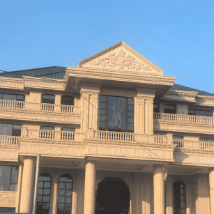 厦门黄金麻别墅外墙干挂石材效果示例