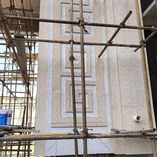 厦门 黄金麻花岗岩别墅外墙干挂回纹造型效果