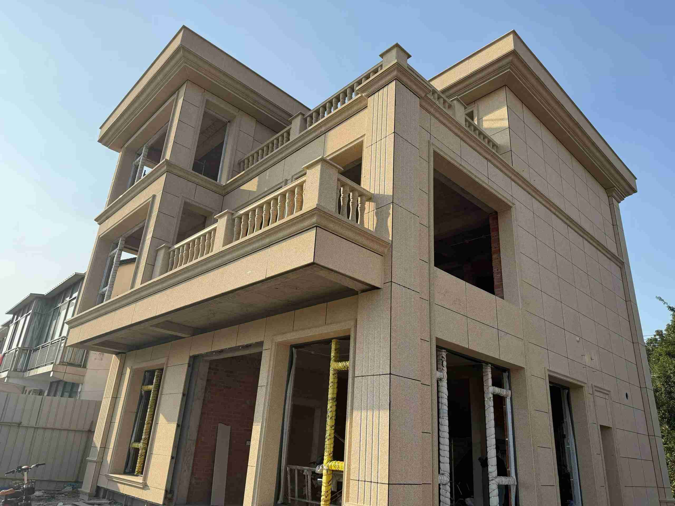 厦门 黄金麻花岗岩石材荔枝面外墙干挂效果展示